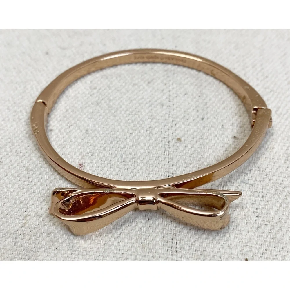 KATE SPADE • Rose Gold Bow Love Notes Bangle Bracelet - Picture 3 of 9